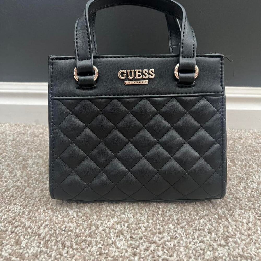 Black quilted mini handbag by